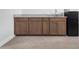 Kitchenette above garage with granite countertop, cabinets, sink, and mini-fridge at 1150 Oak Bluff Ave, Charleston, SC 29492