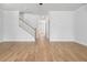 Spacious living room featuring beautiful hardwood floors and ample natural light at 1150 Oak Bluff Ave, Charleston, SC 29492
