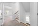 Staircase with wood and white trim, and carpeted steps at 1150 Oak Bluff Ave, Charleston, SC 29492