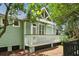Well-maintained home features a lush backyard with a covered porch, perfect for outdoor entertaining at 116 Cartright St, Daniel Island, SC 29492