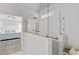 Beautiful bathroom featuring an open walk-in shower with marble walls and glass enclosure at 116 Cartright St, Daniel Island, SC 29492