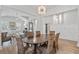 Dining area featuring hardwood floors and open layout to living spaces at 116 Cartright St, Daniel Island, SC 29492