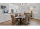 Bright dining area with hardwood floors and a view to the kitchen at 116 Cartright St, Daniel Island, SC 29492