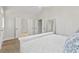 Comfortable main bedroom features fan and decor at 116 Cartright St, Daniel Island, SC 29492