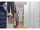 Walk-in closet offering ample storage space with shelving and rod hanging for organized wardrobe at 116 Cartright St, Daniel Island, SC 29492