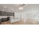Modern kitchen with stainless steel appliances, gray cabinets, and island at 117 Palfrey Dr, Ridgeville, SC 29472