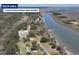 Aerial view of Buck Hall with a river at 1183 Reserve Ln, Awendaw, SC 29429
