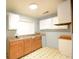 Cozy kitchen with classic cabinets, complemented by durable countertops and natural light at 1203 Hawthorne Rd, Hanahan, SC 29410