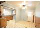 Functional kitchen with ample cabinet space and vintage tile flooring at 1203 Hawthorne Rd, Hanahan, SC 29410
