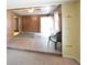 Inviting living room showcasing hardwood floors and wood-paneled walls at 1203 Hawthorne Rd, Hanahan, SC 29410