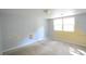 Room with neutral walls, carpet flooring, and a bright window at 1203 Hawthorne Rd, Hanahan, SC 29410