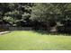 Expansive, fenced backyard offering plenty of space for recreation and privacy at 122 Avalon Rd, Summerville, SC 29483
