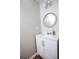 Modern bathroom vanity features a white countertop, decorative mirror, and ample storage at 122 Avalon Rd, Summerville, SC 29483