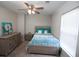 Comfortable bedroom with ceiling fan, natural light, and neutral decor at 122 Avalon Rd, Summerville, SC 29483