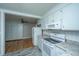 Traditional kitchen with white cabinets, granite counters, and appliances at 1369 Miles Dr, Charleston, SC 29407
