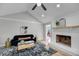 Inviting living room with a brick fireplace, soft couch, modern decor, and plenty of natural light at 1393 Secessionville Rd, Charleston, SC 29412