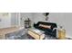 The cozy living room features modern furnishings, including a comfortable sofa and stylish decor at 1393 Secessionville Rd, Charleston, SC 29412