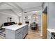 An open floor plan showcases the kitchen, dining area, and living room, promoting a spacious and connected living space at 1393 Secessionville Rd, Charleston, SC 29412