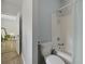 A clean bathroom featuring a toilet and bathtub, showcasing a functional and simple design with light blue walls at 1493 Little Rock Blvd, Charleston, SC 29412