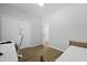 Bedroom with wood floors, large closet, a ceiling fan, and white walls that provide a clean and airy feel at 1493 Little Rock Blvd, Charleston, SC 29412