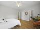 Bedroom features hardwood floors, a bed, and doorways to other areas of the home at 1493 Little Rock Blvd, Charleston, SC 29412