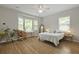 Bright bedroom with a bay window, hardwood floors, and minimal decor at 1493 Little Rock Blvd, Charleston, SC 29412