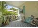 Relaxing front porch with stylish seating and plants providing a cozy outdoor retreat at 1493 Little Rock Blvd, Charleston, SC 29412