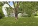 Charming home with a well-manicured front yard and a cozy covered porch, enhancing curb appeal at 1493 Little Rock Blvd, Charleston, SC 29412