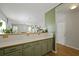 Open view from the kitchen into the living area showing ample countertop space and cabinets at 1493 Little Rock Blvd, Charleston, SC 29412