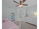 Bedroom featuring neutral walls, a ceiling fan and built-in bookcase at 1514 Stanwick Dr, Johns Island, SC 29455