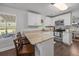 Well-lit kitchen featuring stainless steel appliances, granite countertops and a cozy breakfast bar at 1514 Stanwick Dr, Johns Island, SC 29455