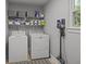 Laundry room featuring a washer, dryer, shelving and vacuum cleaner at 1514 Stanwick Dr, Johns Island, SC 29455