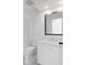 Clean, bright bathroom featuring a large mirror, vanity, and modern fixtures at 1530 Fort Johnson Rd # 2E, Charleston, SC 29412