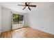 Well lit bedroom featuring hardwood floors and a window with natural light at 1530 Fort Johnson Rd # 2E, Charleston, SC 29412