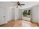 Bedroom featuring hardwood floors, ceiling fan, large windows and closet space at 1530 Fort Johnson Rd # 2E, Charleston, SC 29412