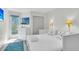 Inviting bedroom with large window, closet, stylish decor, and a comfortable bed with plush pillows and linens at 1723 Live Oak Park, Seabrook Island, SC 29455