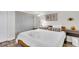 Well-lit bedroom with closet, stylish decor, and a comfortable bed with plush pillows and a throw at 1723 Live Oak Park, Seabrook Island, SC 29455