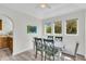 Cozy dining room featuring marsh views, seating for six, and a bright, airy atmosphere at 1723 Live Oak Park, Seabrook Island, SC 29455