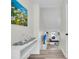 Bright hallway with decor, leading to cozy living space with bench seating and natural light at 1723 Live Oak Park, Seabrook Island, SC 29455