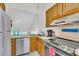 Functional kitchen featuring stainless steel appliances, warm wooden cabinetry, and a bright, open feel at 1723 Live Oak Park, Seabrook Island, SC 29455