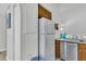Functional kitchenette area featuring stainless steel appliances, cabinetry, and bright natural light at 1723 Live Oak Park, Seabrook Island, SC 29455