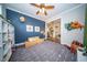 Spacious ' bedroom with dark accent wall, lots of storage, and modern furnishings at 1726 Winfield Way, Charleston, SC 29414