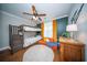 Charming ' bedroom with a bunk bed, orange futon, and playful dinosaur-themed decor at 1726 Winfield Way, Charleston, SC 29414