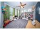 Playful bedroom featuring built-in shelving, a comfortable couch, and a large area rug at 1726 Winfield Way, Charleston, SC 29414