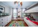 Nicely appointed bedroom features bunk beds, hardwood floors and a fun city-themed rug at 1726 Winfield Way, Charleston, SC 29414