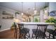 Eat-in kitchen featuring a bar counter and lighting fixtures, ideal for modern living and entertaining at 1726 Winfield Way, Charleston, SC 29414