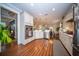 Spacious kitchen with white cabinets, hardwood floors, and stainless appliances offering an eat-in counter at 1726 Winfield Way, Charleston, SC 29414