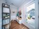 Charming mudroom with built-in storage, shelving, and convenient access to the home's outdoor patio at 1726 Winfield Way, Charleston, SC 29414
