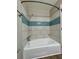 Bright bathroom features a tiled tub and shower combination at 1820 Mepkin Rd # 1019, Charleston, SC 29407