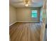 Bedroom features laminate flooring, neutral paint, natural lighting, and a ceiling fan at 1820 Mepkin Rd # 1019, Charleston, SC 29407